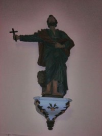 Statue de saint Marc située sur le mur droit de la nef.